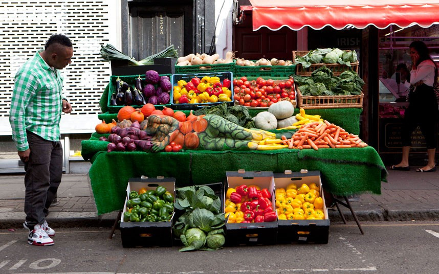An urban camouflage model blends into a fruit and veg stall in London. TV channel Really teamed up with make-up artist Carolyn Roper to hide models in the city to mark the UK premiere of the new series of CIA drama Covert Affairs, on Wednesdays at 9pm from 19 September... 
