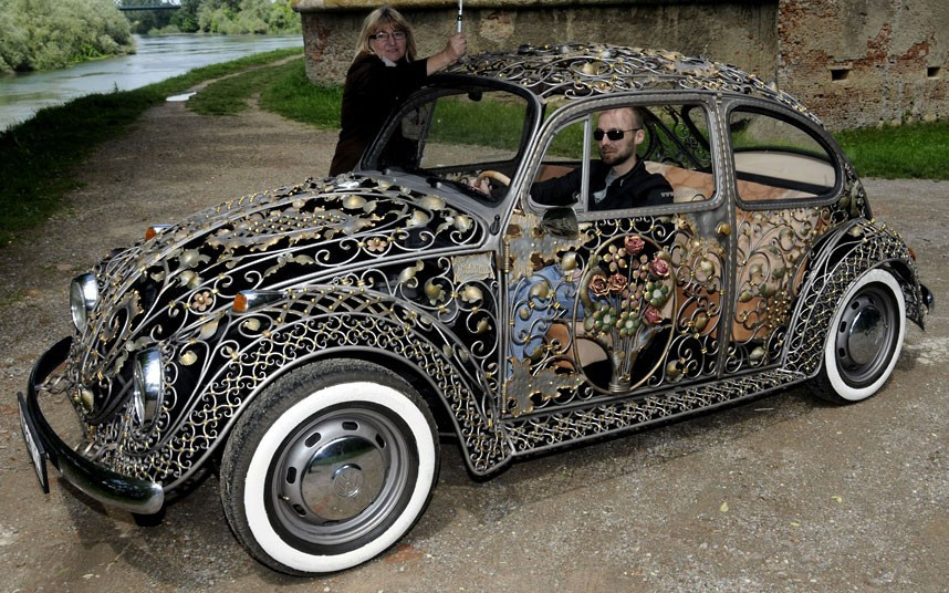 Croatian company MG Vrbanus is more used to making gates and fencing but decided to make a wrought-iron VW Beetle to promote their work. The project took four months and 3000 man hours to complete with details including exterior 24-carat gold leaf and hand-stitched leather interior. Fashioned from a white 1970 Type 1, the car was completely stripped down to the bare mechanics before the ornate body was applied.