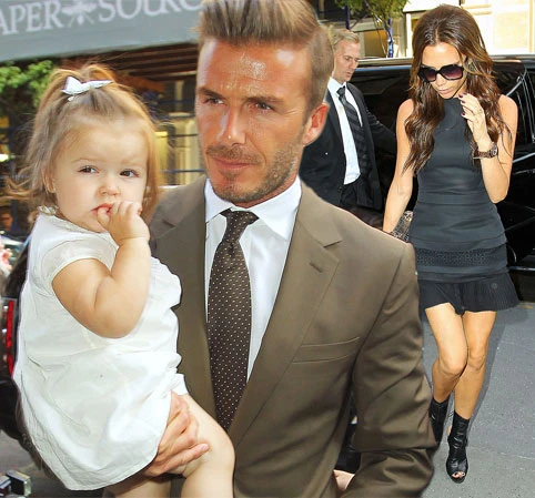 Beckham bế con gái đi cổ vũ vợ tại buổi trình diễn BST Xuân Hè 2013