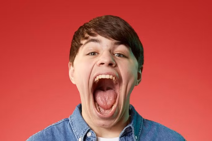 Isaac Johnson phá kỷ lục thế giới với khuôn miệng rộng 10,196 cm. Ảnh: Guinness World Records.