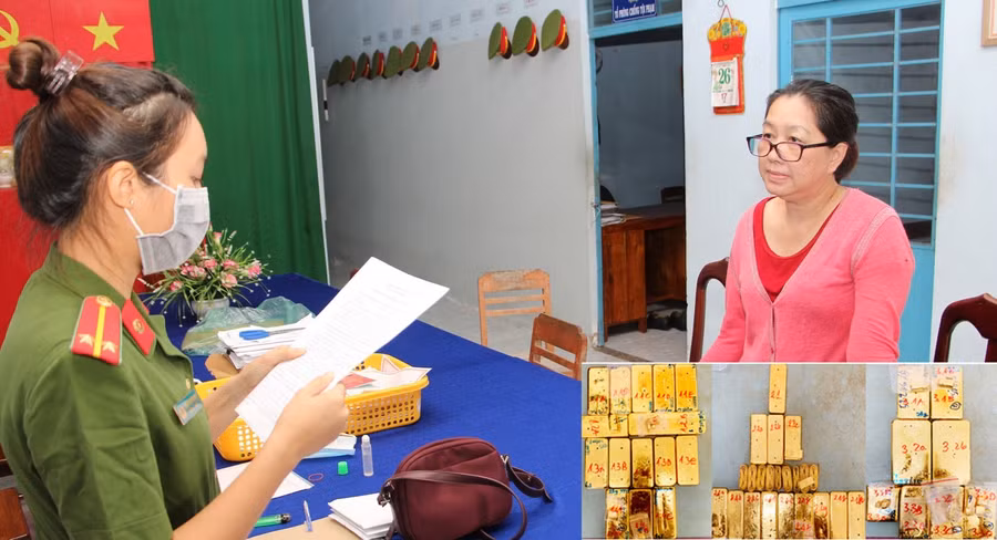 Nguyễn Thị Kim Hạnh (tức Mười Tường) nghe đọc lệnh bắt giam. Ảnh: Công an An Giang.