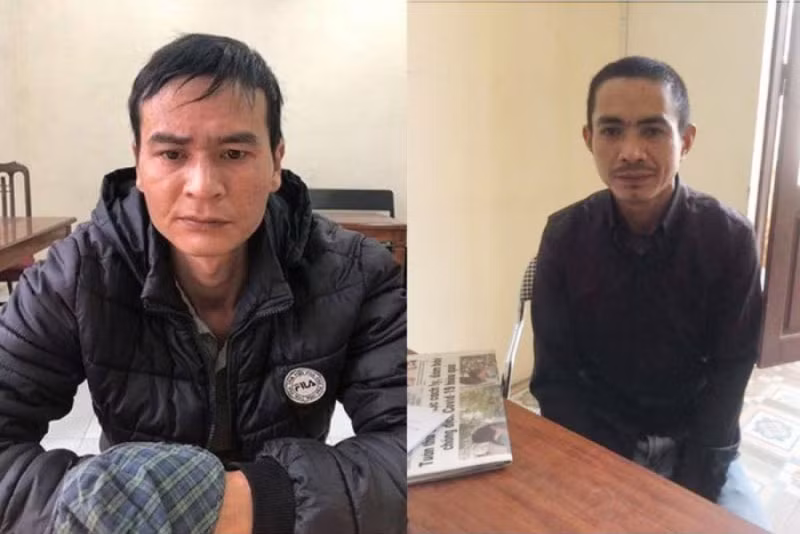 Đối tượng Nguyễn Xuân Trung (trái) và Nguyễn Văn Quân tại cơ quan điều tra