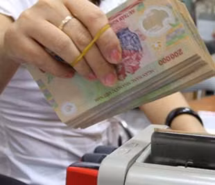 Cần vốn, ngân hàng lại tăng lãi suất huy động ảnh 1