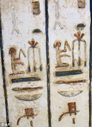 Hieroglyphs carved into the rock reveal the name and position of Ptahmes (left), the mayor of the ancient Egyptian capital Memphis. Right: The head of a female statue found within the tomb Read more: http://www.dailymail.co.uk/sciencetech/article-1282628/Ancient-Egyptian-mayors-tomb-century-lost.html#ixzz0pSgLJ9n4