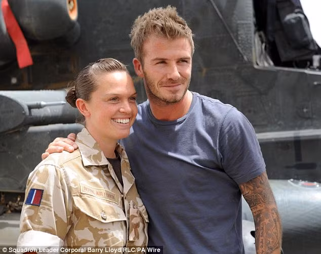 Senior aircraftsman SAC Madeline Rowe from RAF Odiham has her picture taken with the player Read more: http://www.dailymail.co.uk/news/worldnews/article-1280468/David-Beckham-hails-amazing-troops-visit-Afghanistan.html#ixzz0olSMIu00