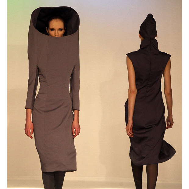 Models display creations by fashion designer Maria Tsuman during a fashion show in Moscow