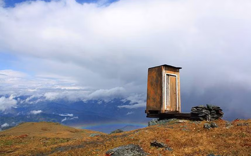 This lonely lavatory has been dubbed the most extreme toilet in the world perched on a cliff 8,500 feet above sea level in Siberia. The precarious privy in the Altai Mountains, Russia serves the remote weather station at Kara-Tyurek - literally Black Heart in the local South Altayan language - which began working in 1939. Five staff man the station at this outpost and this is their only toilet. They are visited once a month by a postman to collect the weather data, and a helicopter delivers supplies of food and water each autumn.