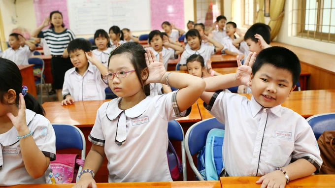 Một tiết học tiếng Anh theo chương trình tiếng Anh đề án - Ảnh: Tuoitre