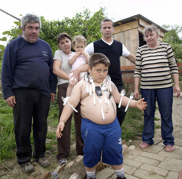 Ladies and gentlemen, we give you Magnetic Boy: six-year-old Ivan Stoilikovic from Koprivnica in Croatia. His family claim that when he takes off his shirt, metallic objects such as spoons, mobile phones and even frying pans stick to his body. In total, his family says, he can carry up to 25kg of metal stuck to his torso...