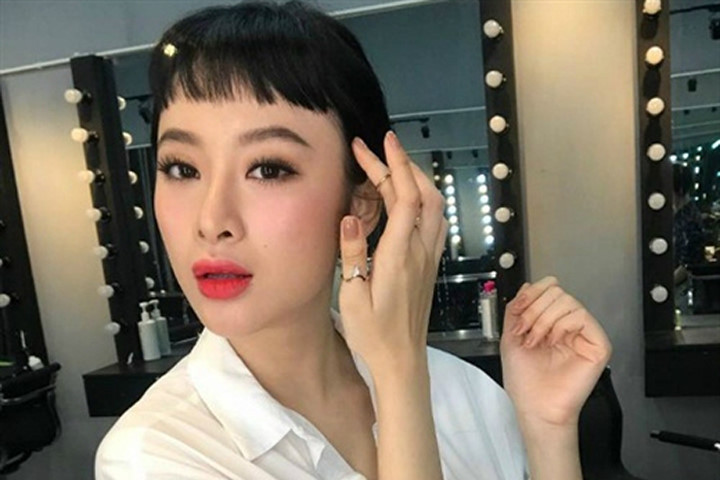 Vợ Lam Trường sắp sinh, Angela Phương Trinh lạ lẫm với mái ngố siêu ngắn