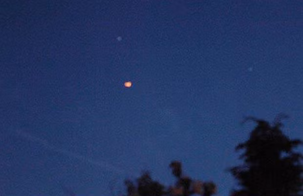 Orange ball-shaped UFO seen over Merseyside around 10.30pm on Sunday May 25 2009 In Liverpool