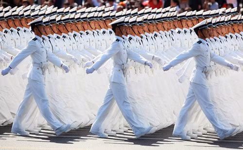 Chinese People’s Liberation Army (PLA) sailors march pass Tiananmen Square during the celebration of the 60th anniversary of the founding of the People’s Republic of China on October 1, 2009 in Beijing, China.