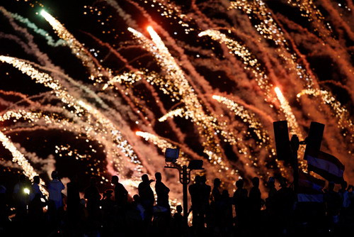 U.S. Navy Chief Petty Officer Bill Mesta replaces an official picture of outgoing President George W. Bush with that of newly-sworn-in U.S. President Barack Obama, in the lobby of the headquarters of the U.S. Naval Base January 20, 2009 in Guantanamo Bay, Cuba. (Brennan Linsley-Pool/Getty Images)