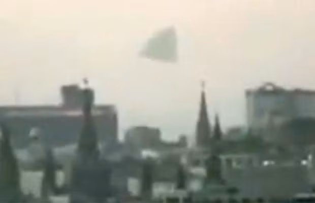 A giant pyramid which appeared to be a UFO hovering over the Kremlin caused frenzied speculation in Russia that it was an alien spacecraft