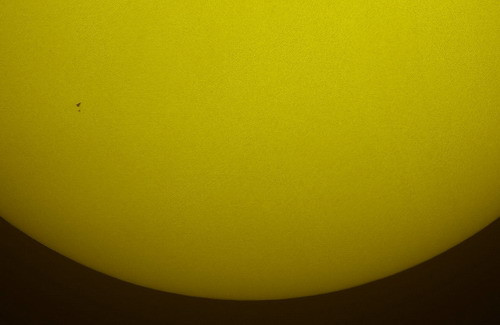 The NASA space shuttle Atlantis and the Hubble Space Telescope are seen in silhouette, side by side during solar transit on May 13, 2009, from west of Vero Beach, Florida in this image released by NASA May 14. The two spaceships were at an altitude of 600 km (375 miles) and they zipped across the sun in only 0.8 seconds during a risky but successful mission to rescue the Hubble telescope. (REUTERS/Thierry Legault/NASA/Handout)