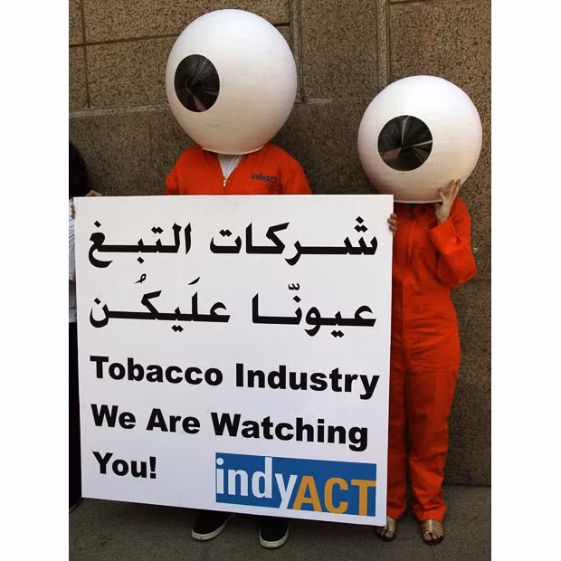 Activists from Indy ACT protest outside the offices of Philip Morris, calling on the tobacco industry not to interfere in the Lebanese government’s discussions on banning smoking in public places