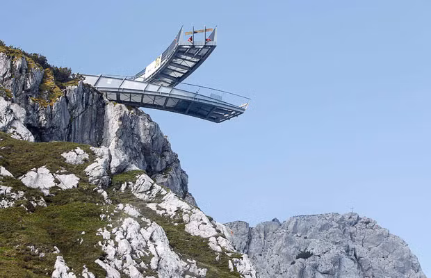 Employees work on the AlpspiX viewing platform at the southern Bavarian Alps mountain Alpspitze in Garmisch-Partenkirchen. Each arm of the platform is 25 metres (82 feet) long and will end with a glass wall providing panoramas of Hoellental and Garmisch with a spectacular view down 1,000 metres below. It is due to open on July 4