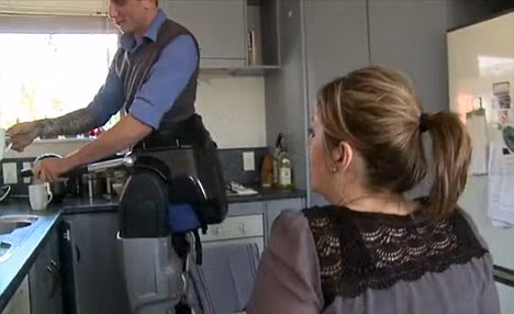 Hayden uses his newfound motor skills around the kitchen Read more: http://www.dailymail.co.uk/sciencetech/article-1295024/Bionic-legs-let-paralysed-man-walk-again.html#ixzz0tozXzxuN