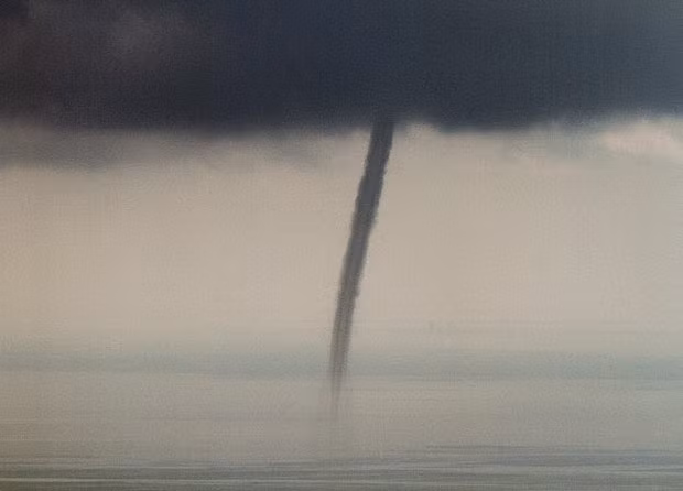 A water spout moves across the Gulf of Mexico northwest of the Deepwater Horizon oil spill