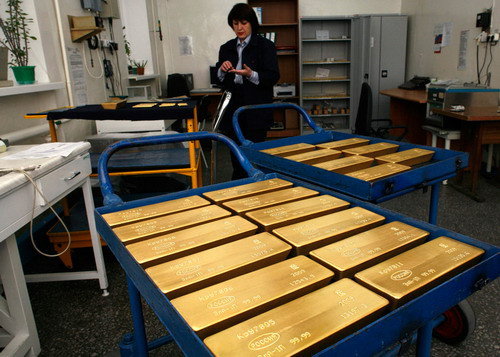 Trays with gold ingots are placed in a room for final weighing and packaging at the Krastsvetmet plant in the Siberian city of Krasnoyarsk