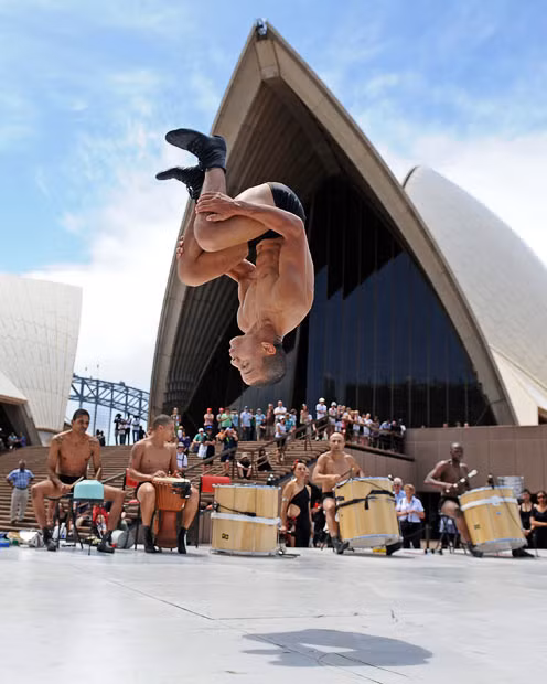 Brazil’s Bale de Rua make their Australian debut by performing as part of the Sydney Festival in front of the Sydney Opera House