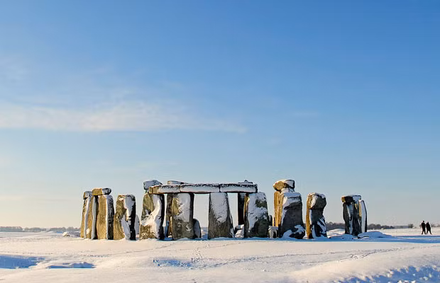 Fallen snow rests on Stonehenge in Salisbury