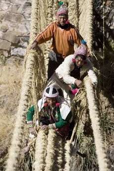 Andean men build the Qeswachaka hanging bridge across the Apurimac river