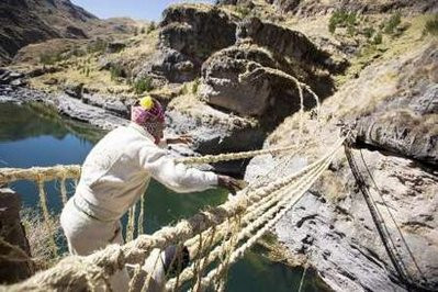 An Andean man participates in the construction 