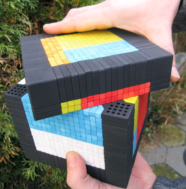 Scientist Oskar van Deventer has spent £1,500 making the world’s biggest Rubik’s cube - and admits he cannot solve it. His puzzle has 1,539 pieces and measures a foot wide. Although he can solve a regular 3x3x3 cube in about two minutes, Oskar admits his cube has him beaten.