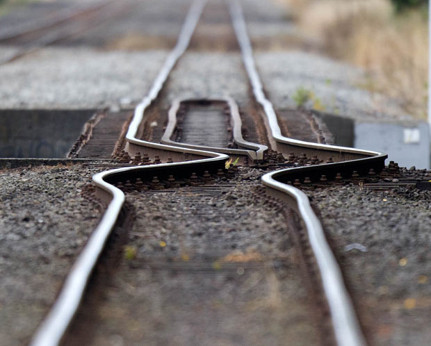 A rail line buckled by the shifting earth is pictured in Christchurch, the day after a deadly 6.3 magnitude earthquake rocked the city