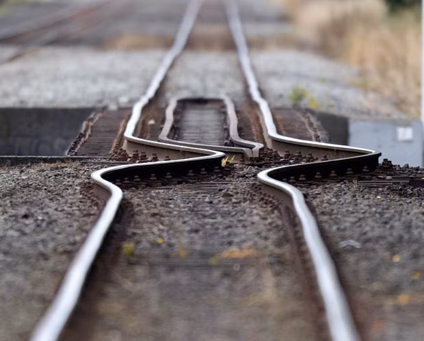 A rail line buckled by the shifting earth is pictured in Christchurch, the day after a deadly 6.3 magnitude earthquake rocked the city