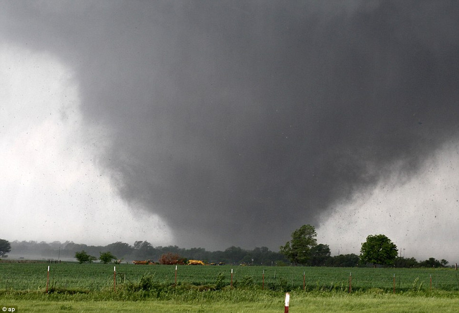 A monstrous tornado roared through the Oklahoma City suburbs, flattening entire neighborhoods with winds up to 200 mph, setting buildings on fire and landing a direct blow on an elementary school Read more: http://www.dailymail.co.uk/news/article-2328000/US-tornadoes-Yet-heartbreak-Oklahoma-massive-tornado-touches-highly-populated-suburb.html#ixzz2TtLveIAC Follow us: @MailOnline on Twitter | DailyMail on Facebook