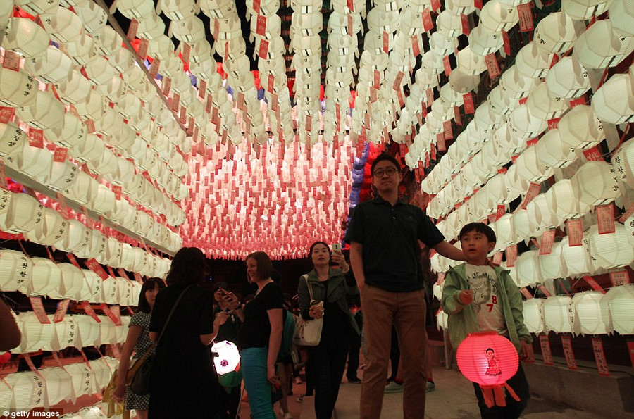 Across Asia, Buddha’s Birthday is celebrated with colourful parades and processions with flowers and floats of white elephants Read more: http://www.dailymail.co.uk/news/article-2323047/South-Korea-lit-sea-lanterns-Seoul-prepares-mark-Buddha-s-birthday.html#ixzz2T5Vj2e1Z Follow us: @MailOnline on Twitter | DailyMail on Facebook