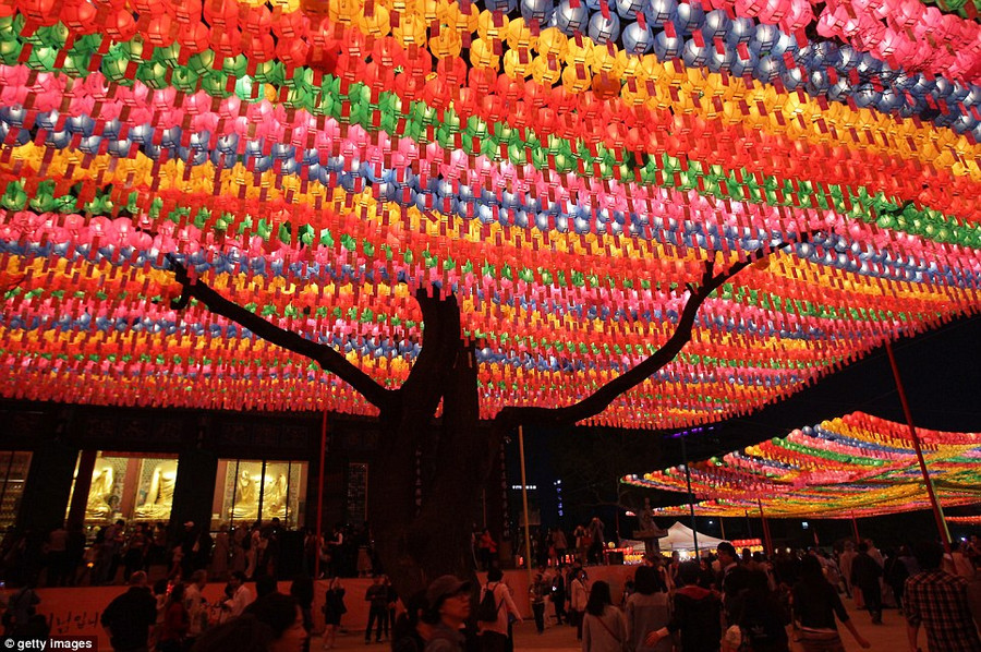 South Korean Buddhists walk under colourful lanterns as they celebrate the forthcoming birthday of Buddha at Chogey temple in Seoul Read more: http://www.dailymail.co.uk/news/article-2323047/South-Korea-lit-sea-lanterns-Seoul-prepares-mark-Buddha-s-birthday.html#ixzz2T5VCAma0 Follow us: @MailOnline on Twitter | DailyMail on Facebook