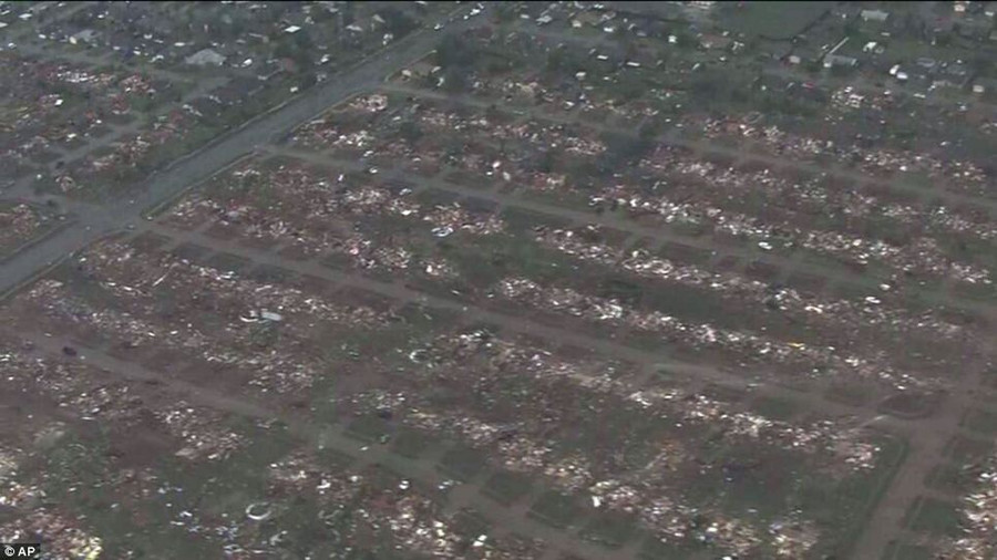 Wiped out: This photo by KFOR-TV shows homes flattened outside Moore, Oklahoma on Monday after a monstrous tornado rattled through Read more: http://www.dailymail.co.uk/news/article-2328000/US-tornadoes-Yet-heartbreak-Oklahoma-massive-tornado-touches-highly-populated-suburb.html#ixzz2TtNunAX3 Follow us: @MailOnline on Twitter | DailyMail on Facebook