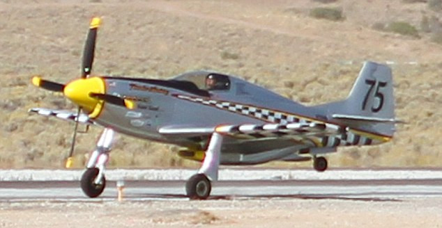 Easy does it: Pilot George Gibony from Des Moines prepares for take-off in his Thunder Mustang aircraft named ’Rapid Travel’ Read more: http://www.dailymail.co.uk/news/article-1313738/Caught-camera-The-spine-chilling-moment-pilot-crashed-plane-ground--climbed-unscathed.html#ixzz0zwylMNL0