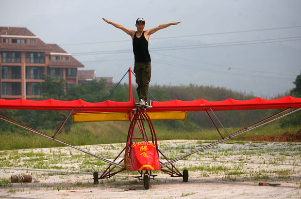 A 24-year-old farmer from Chongqing has spent the past year building his own plane. After 12 months of hard work Zeng Qiang proudly shows off the plane he built - 