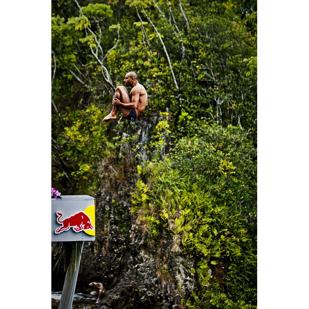 Hassan Mouti of France diving from the 27-metre platform at Kawainui Falls during the sixth and final round of the 2010 Red Bull Cliff Diving World Series in Hilo, Hawaii