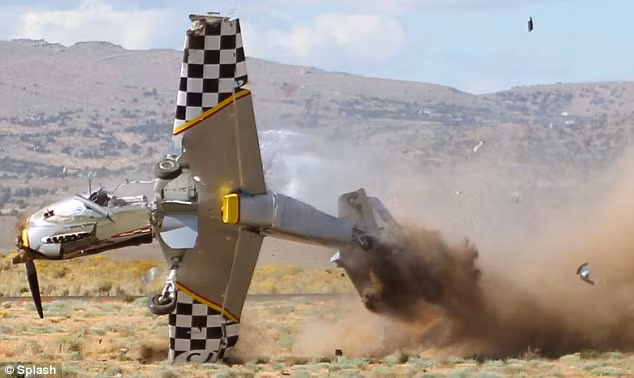 Debris can be seen flying from the plane as it spins out of control Read more: http://www.dailymail.co.uk/news/article-1313738/Caught-camera-The-spine-chilling-moment-pilot-crashed-plane-ground--climbed-unscathed.html#ixzz0zwz1Y61H