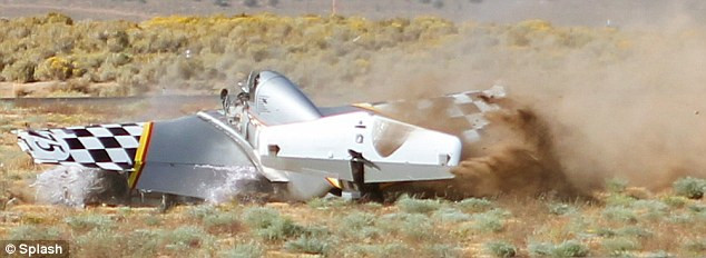The plane eventually grinds to a halt in a crumpled heap. The rest of the races were cancelled due to the high winds being too strong to conduct a safe race Read more: http://www.dailymail.co.uk/news/article-1313738/Caught-camera-The-spine-chilling-moment-pilot-crashed-plane-ground--climbed-unscathed.html#ixzz0zwzTWFa0