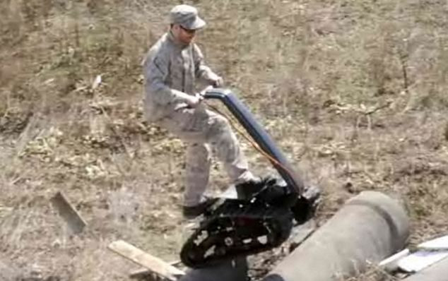 Its tank-like tracks enable it to climb over small obstacles Read more: http://www.dailymail.co.uk/sciencetech/article-1311661/The-DTV-Shredder-The-incredible-motorised-skateboard-looks-like-tank.html#ixzz0zSe2etWq