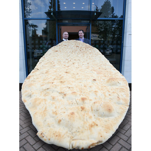 Honeytop Speciality Foods has created the world’s largest ever naan bread. The giant 10ft by 4ft creation has a total area of 40 sq ft - the equivalent of 167 normal size naan breads, and was created by Honeytop to launch Brewers Fayre’s curry nights