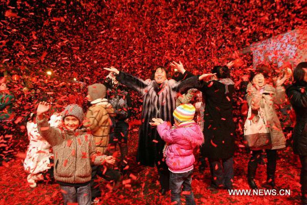 People celebrate during a Spring Festival fair in Bucharest, capital of Romania, Jan. 29, 2011. 