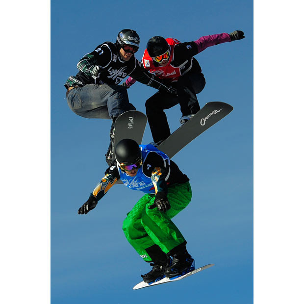 Australia’s Alex Pullin, bottom, competes to win the men’s Snowboard Cross final in La Molina, Spain. Seth Wescott of the US top left, took second place, and Italy’s Luca Matteotti, right, was third