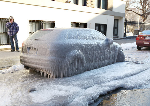 One New Yorker will need more than some hot water and an ice scraper to get going as he wakes to find his car encased in ice. Parked on 2nd street between 1st and 2nd Avenues, the frozen Audi is another victim of the Big Apple’s brush with Arctic conditions.