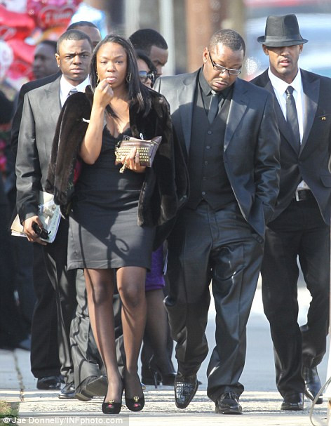 Controversial arrival: Bobby Brown got into an argument with security at the funeral because he arrived with an entourage of nine who were not invited Read more: http://www.dailymail.co.uk/news/article-2102985/Whitney-Houston-Funeral-A-galaxy-stars-gather-New-Jersey-say-goodbye-pop-legend.html#ixzz1mnCvSaBQ