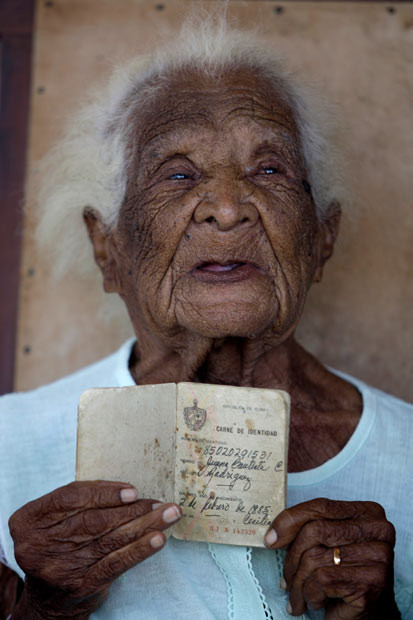 Juana Bautista de la Candelaria Rodriguez shows a civil registry document that states she was born on February 2, 1885, during a party ahead of her 127th birthday at her home in Ceiba Hueca, eastern Cuba. According to the civil registry she is possibly the oldest person in the world...