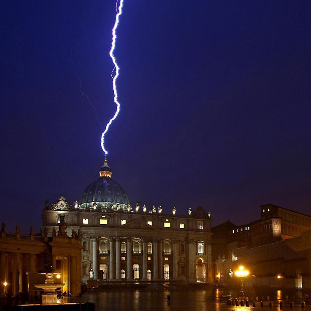 Lighting strikes the dome of the Basilica of St Peter’s in the Vatican, the same day Pope Benedict XVI announced his resignatio