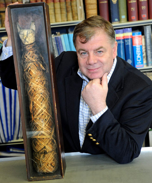 The mummified remains of an ancient Egyptian cat preserved for more than 2,000 years have been found gathering dust in an attic. B&B owner Robert Gray inherited the bandaged artefact when his father died in 1984 but assumed it was stuffed with rags. Nearly three decades on he finally decided to investigate the arcane package and took it along to a vet. To his amazement a series of X-rays revealed the outline of a perfectly preserved cat - complete with its face, ears, spine and brain.