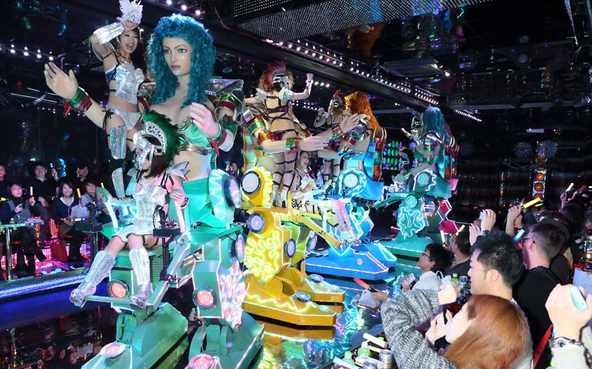 A raunchy robot restaurant has opened in Tokyo, Japan. The strange eatery, which is in the city’s Shinjuku Kabukicho District, is patrolled by giant ’fembots’. These statuesque female robots are controlled by real-life, scantily-clad women.